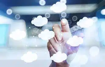 Hand touching cloud icons representing warehouse management software services and digital solutions