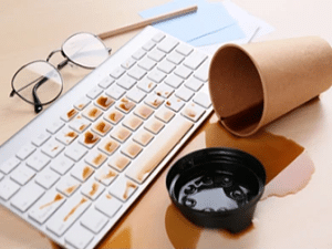 coffee spilled on computer keyboard