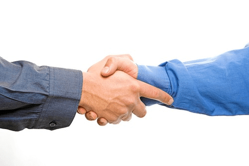 two people shaking hands