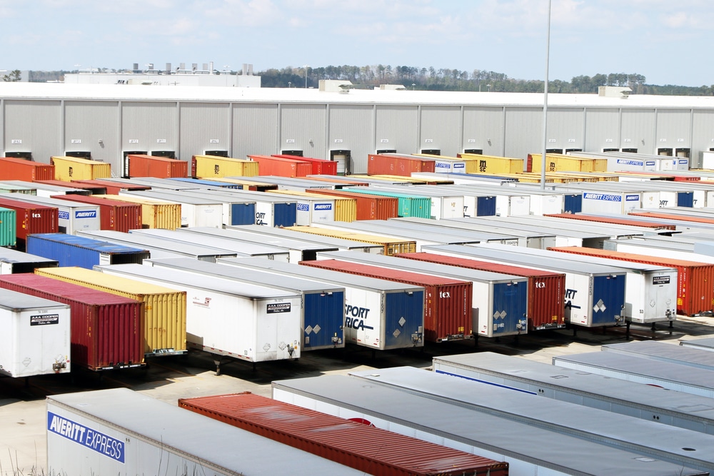 warehouse yard with parked semi trucks
