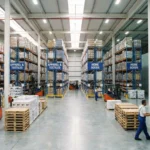 A well-organized warehouse with various sections for different goods